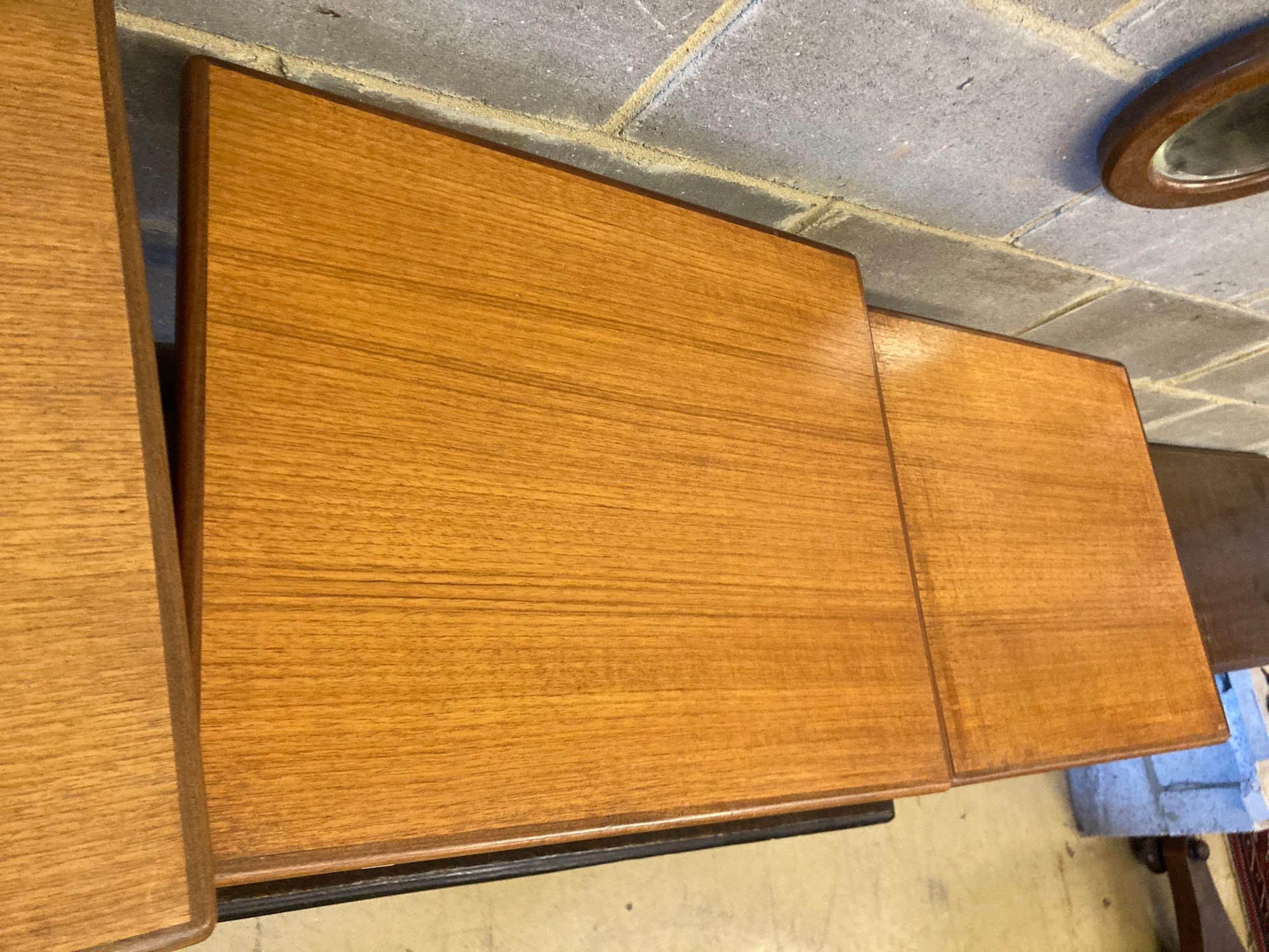 A nest of three G plan teak occasional tables, width 56cm